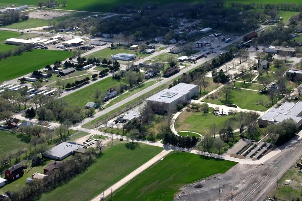 An aerial view of a large green field.